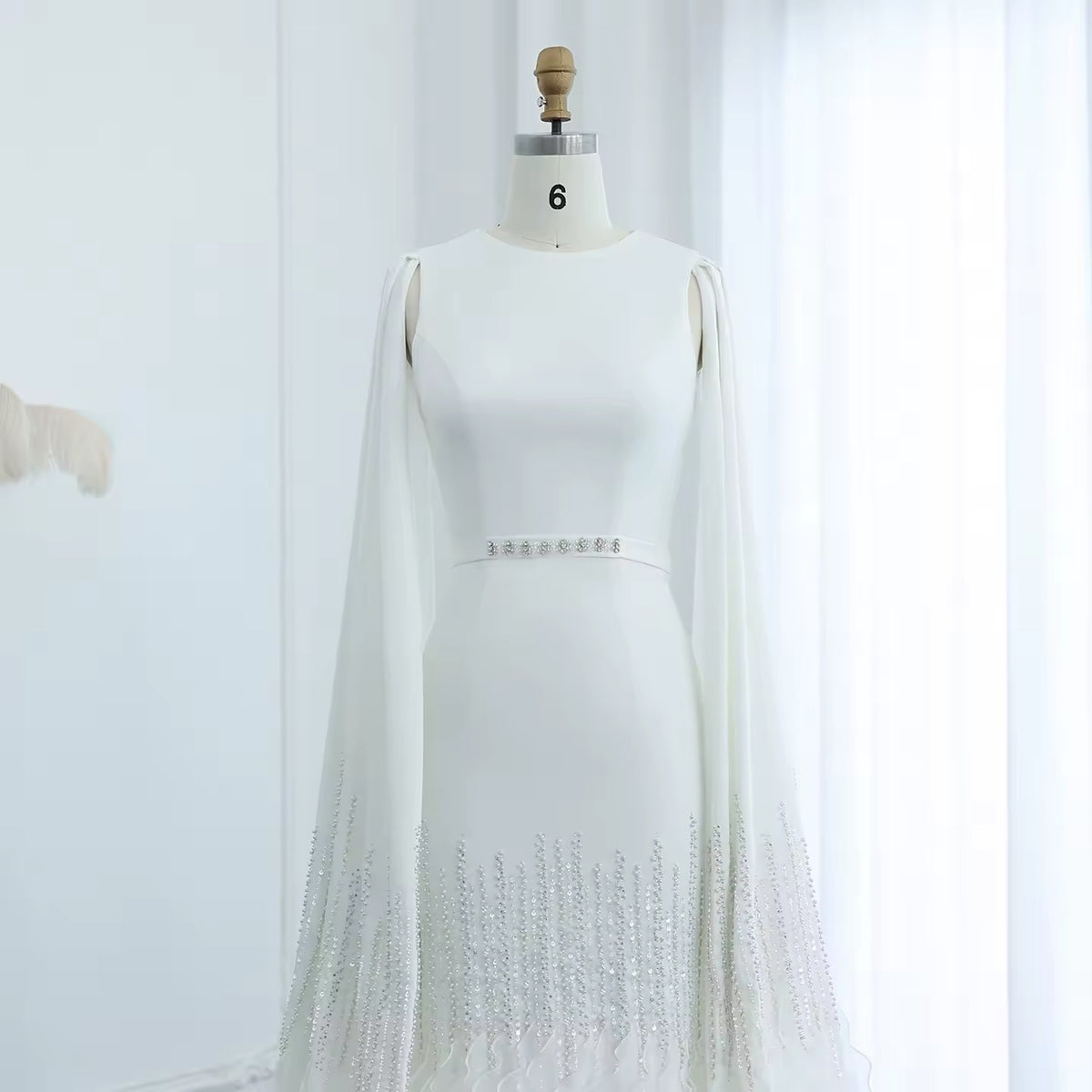 Luxury evening dress with long sleeves