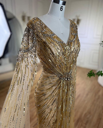 Elegant Fitted Gown with Beaded Details and Dramatic Cape
