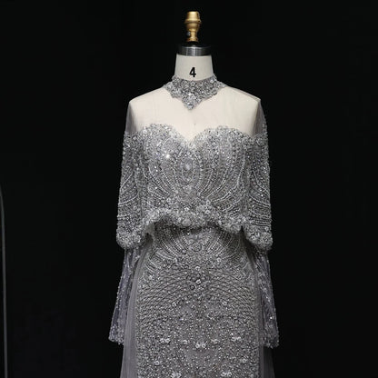 “Silver Cascade” Beaded Gown with Draped Crystal Sleeves and Matching Overlay