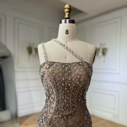 “Crystal Symphony” Gown Nude crystal-embellished evening dress with asymmetric strap