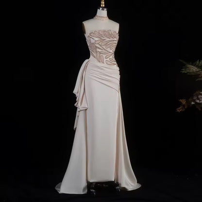 Luxury Ivory Gown with Crystal Embroidery and Side Draping