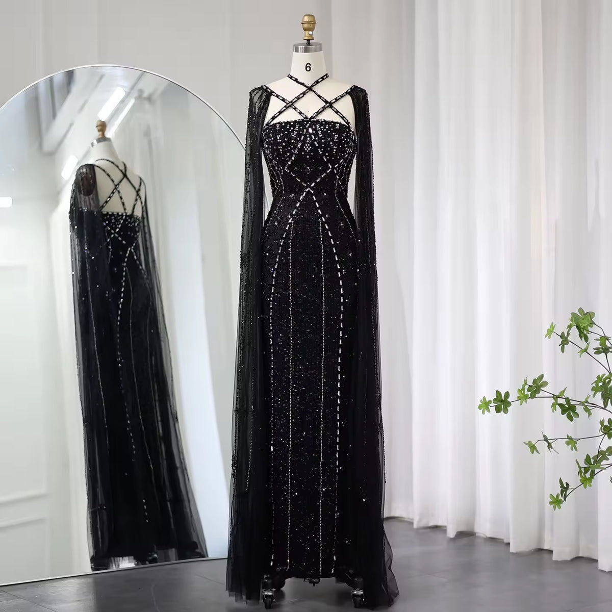 Elegant Beaded Gown with Open Sleeves and Crystal Detailing