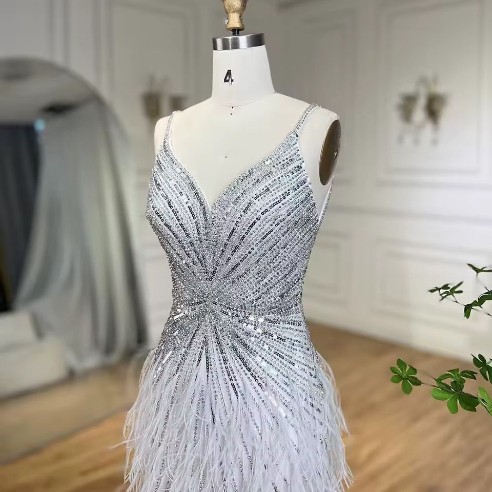 Luxury dress decorated with crystal and feathers