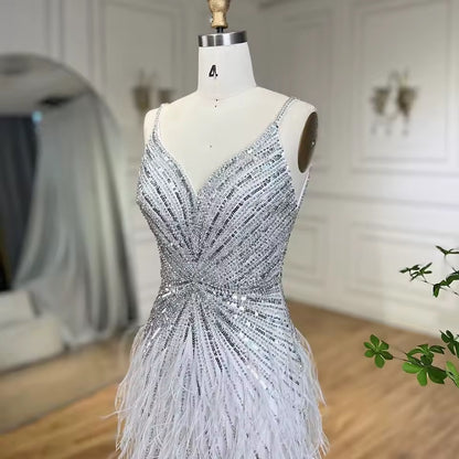 Luxury dress decorated with crystal and feathers