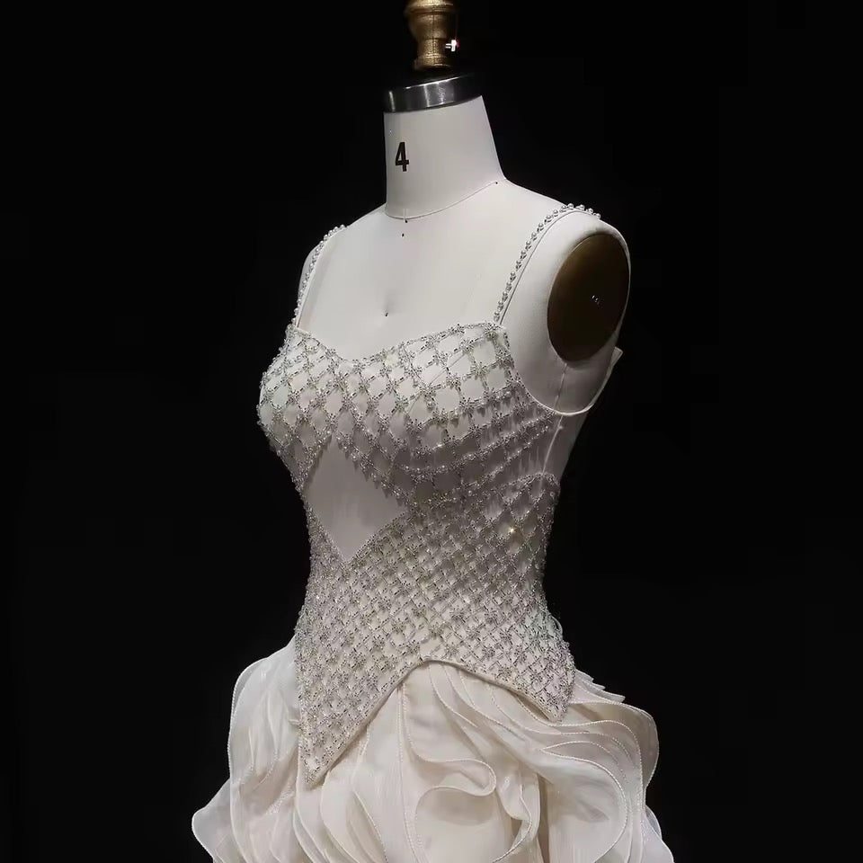 Elegant Off-White Crystal Bodice Gown with Voluminous Tulle Waves