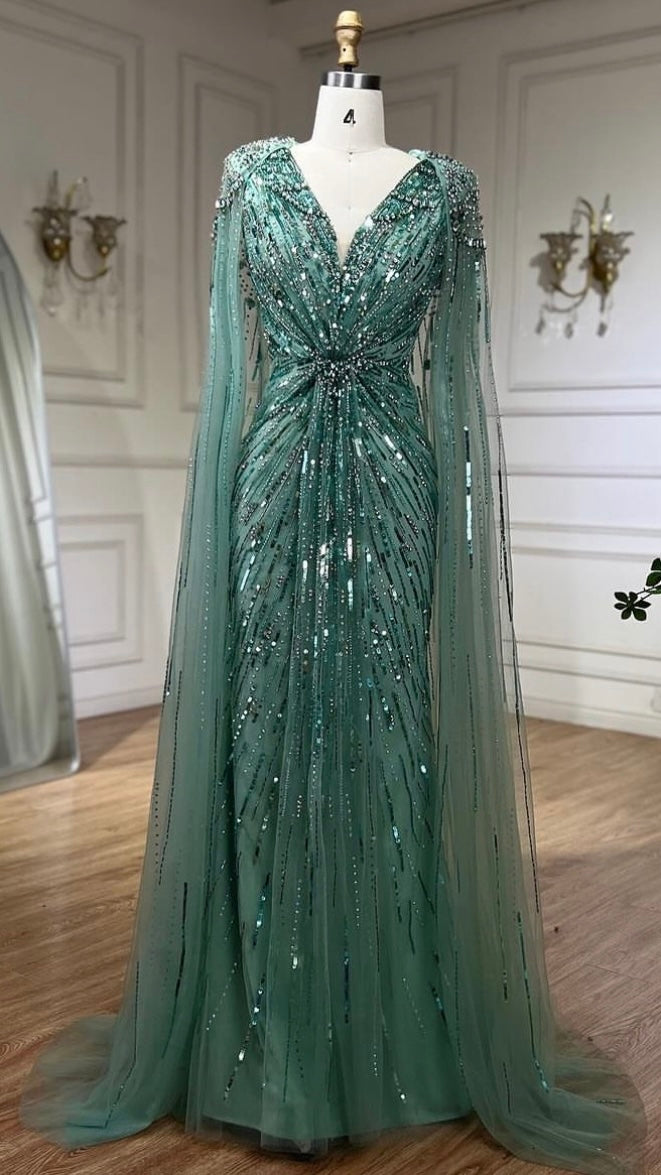 Elegant Fitted Gown with Beaded Details and Dramatic Cape