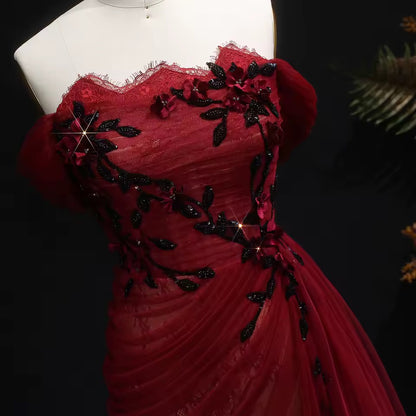 Red Evening Gown with Draped Tulle and Black Embroidery