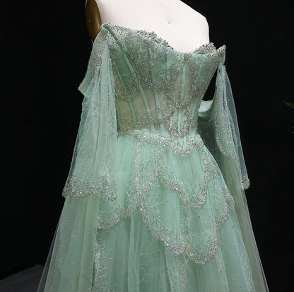 ‏Luxury Sage Green Off-Shoulder Evening Gown with Cape Sleeves