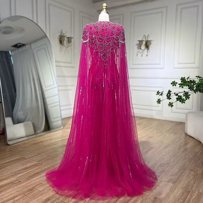 Elegant Fitted Gown with Beaded Details and Dramatic Cape
