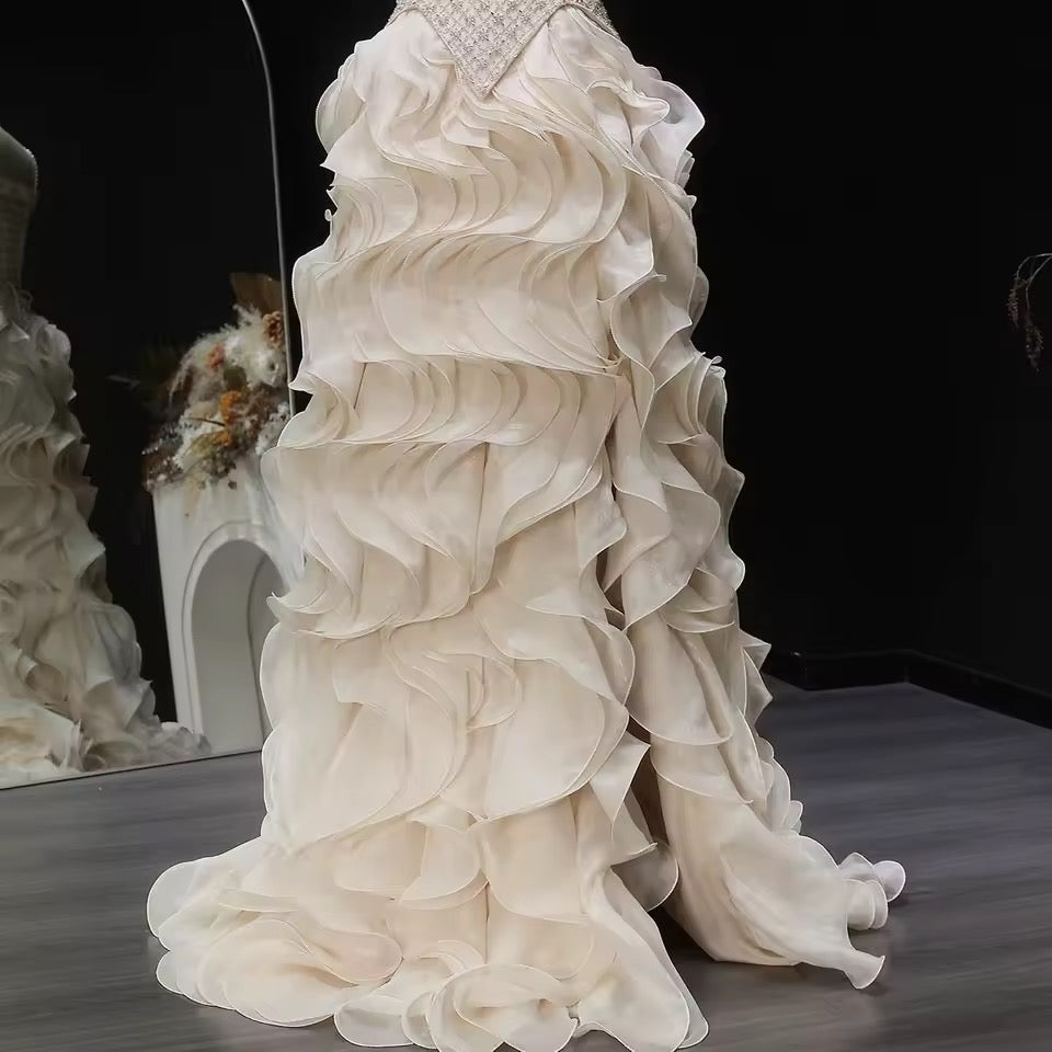 Elegant Off-White Crystal Bodice Gown with Voluminous Tulle Waves