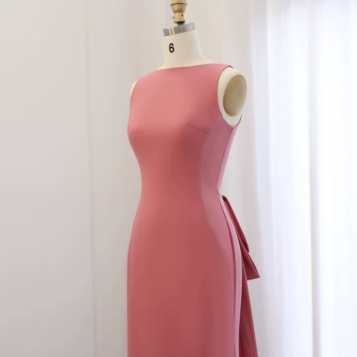 Elegant Fitted Gown with Beaded Butterfly Detail