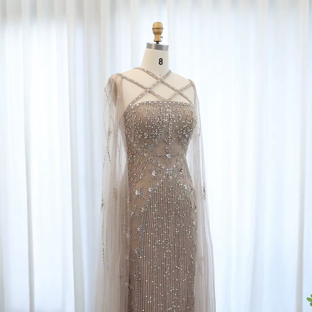 Elegant Beaded Gown with Open Sleeves and Crystal Detailing