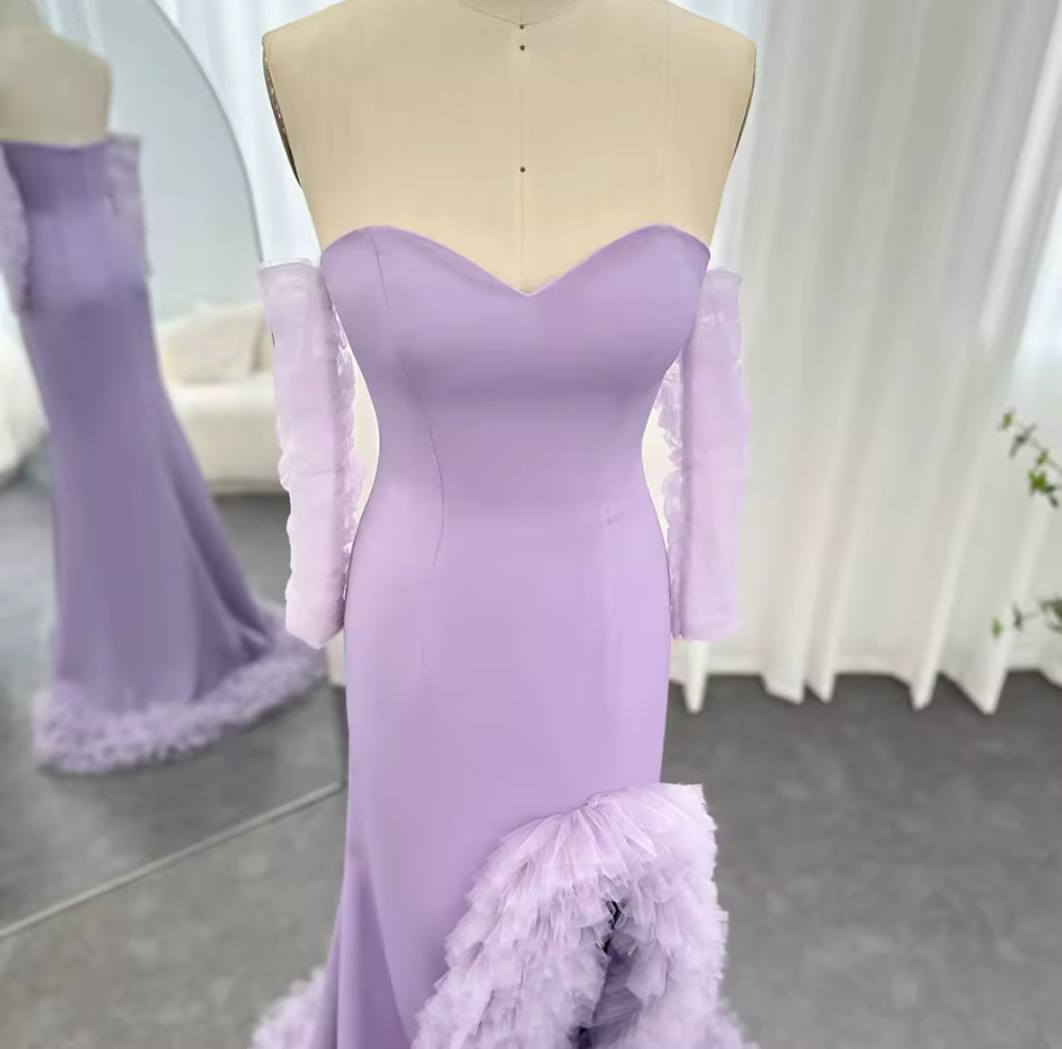 Lilac dress with ruffles