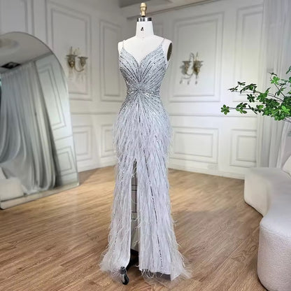 Luxury dress decorated with crystal and feathers