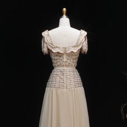 Elegant Fully Beaded Crop Top and Draped Skirt Set with Delicate Bows