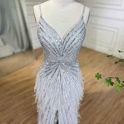 Luxury dress decorated with crystal and feathers