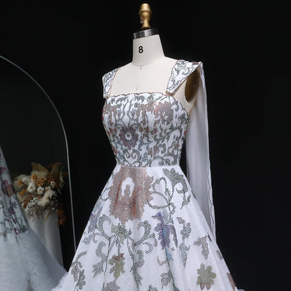 Crystal-Embroidered Couture Gown with Regal Drapes