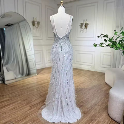 Luxury dress decorated with crystal and feathers