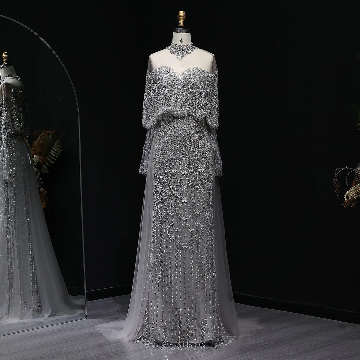 “Silver Cascade” Beaded Gown with Draped Crystal Sleeves and Matching Overlay