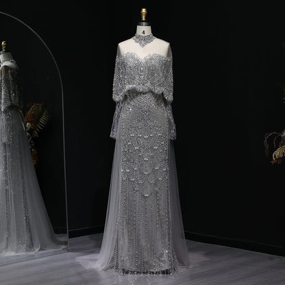 “Silver Cascade” Beaded Gown with Draped Crystal Sleeves and Matching Overlay