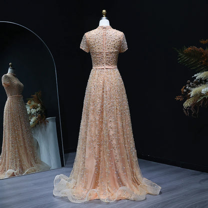 Elegant Embroidered Peach Evening Gown with Bow Luxury Beaded Dress
