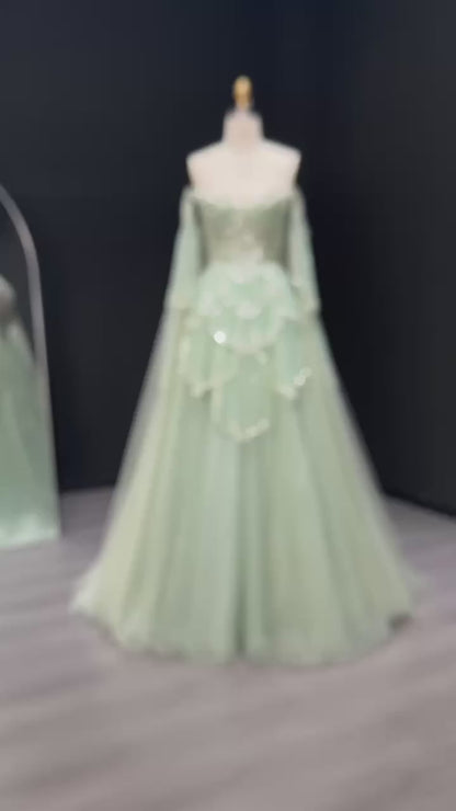 ‏Luxury Sage Green Off-Shoulder Evening Gown with Cape Sleeves